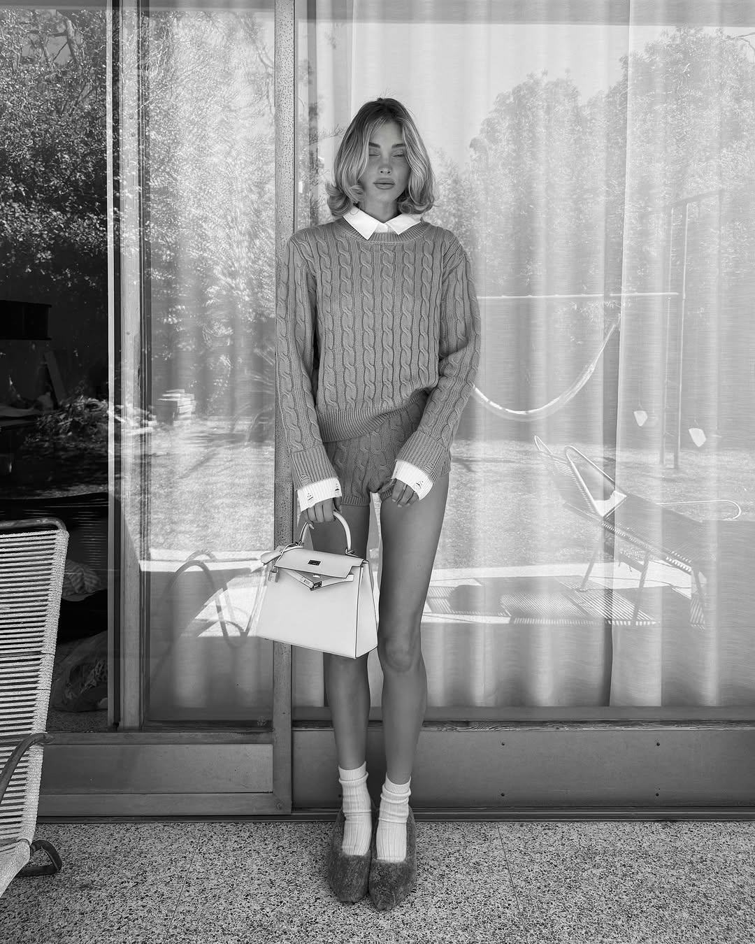 Elsa Hosk wears a gray knit set.