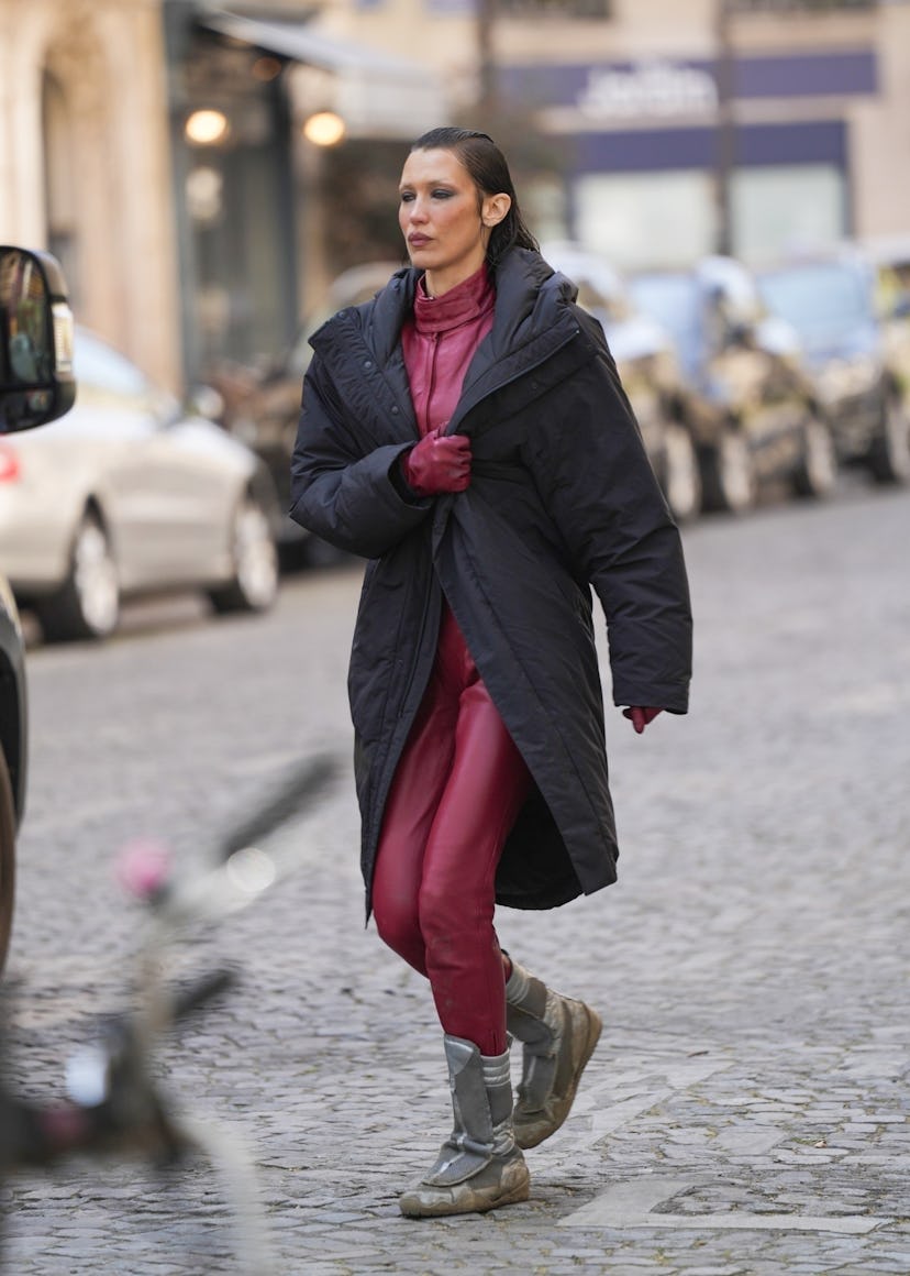 Bella Hadid on the set of The Beauty in red leather coords.