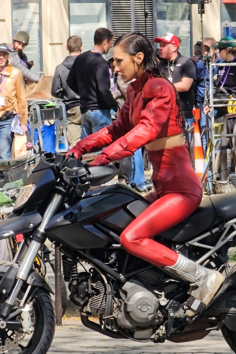 Bella Hadid on the set of The Beauty in red leather coords.