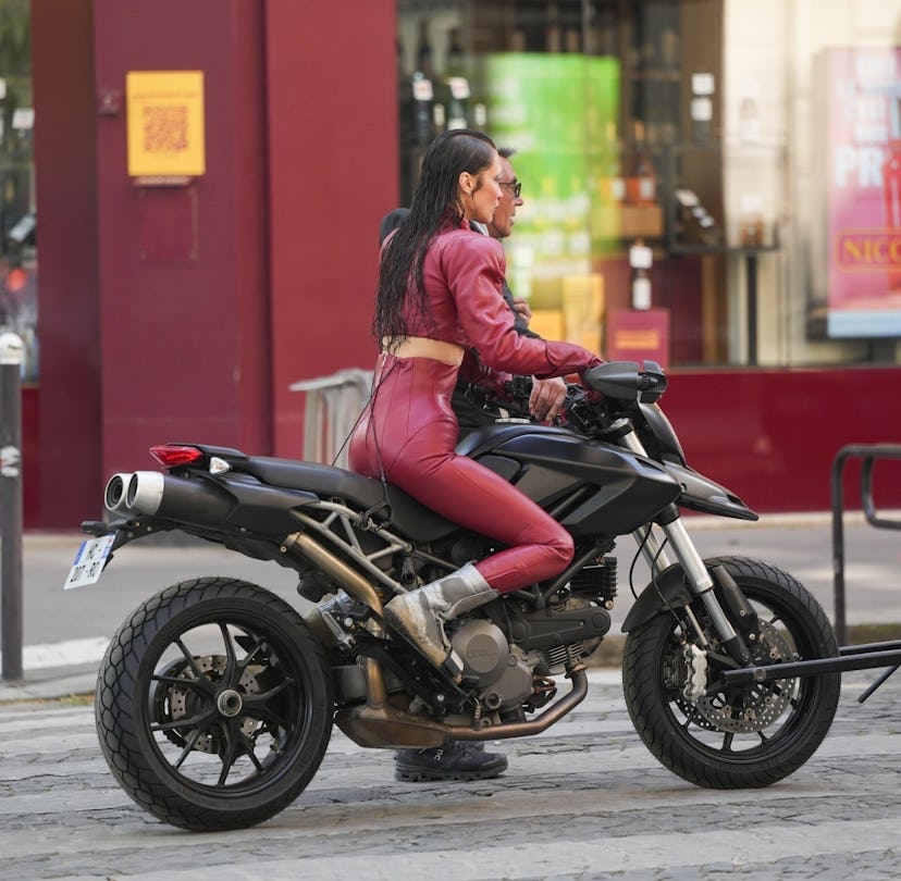Bella Hadid on the set of The Beauty in red leather coords.