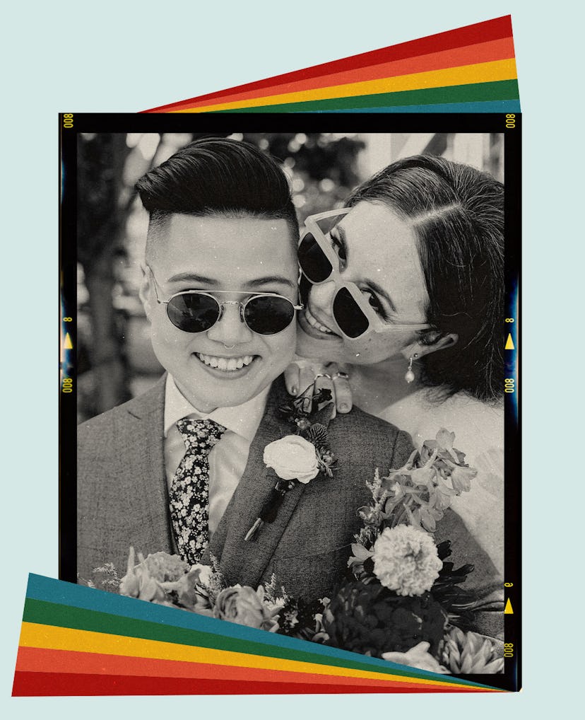 A queer couple poses together in a portrait on their wedding day