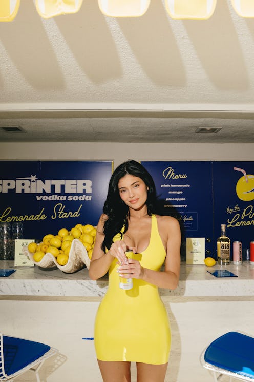 Kylie Jenner wore a yellow latex minidress and held a matching Sprinter vodka can at Coachella 2025.