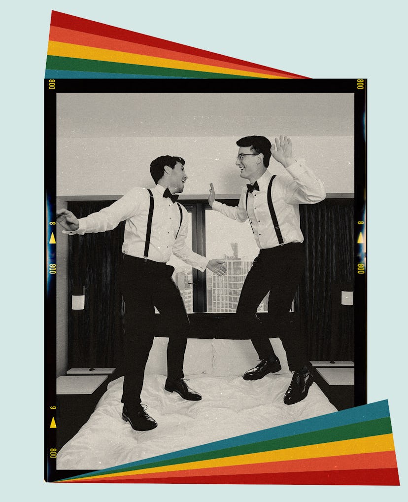 Queer newlyweds jump on top of their hotel room bed following their wedding