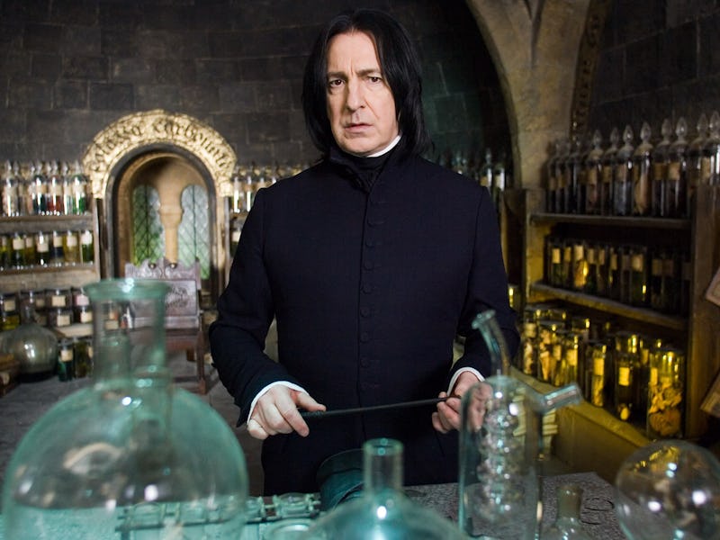 A character in dark robes stands at a potion-making table, surrounded by glass bottles and jars in a...