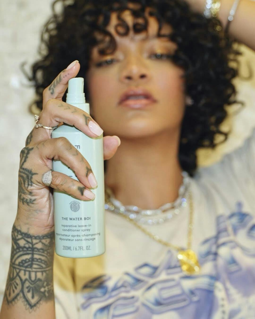 fenty hair, rihanna shows off leave in conditioner