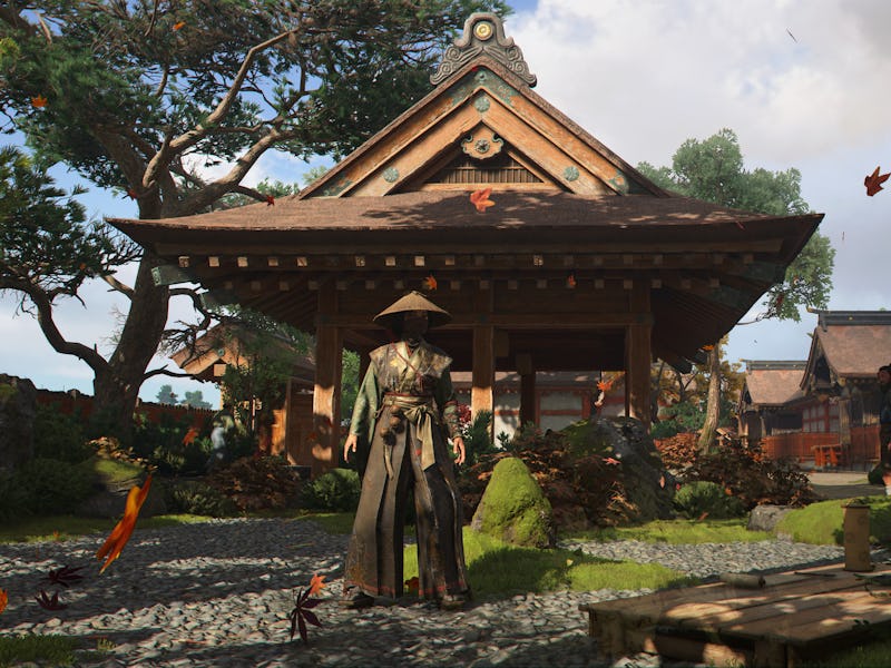 Naoe stands in front of a temple