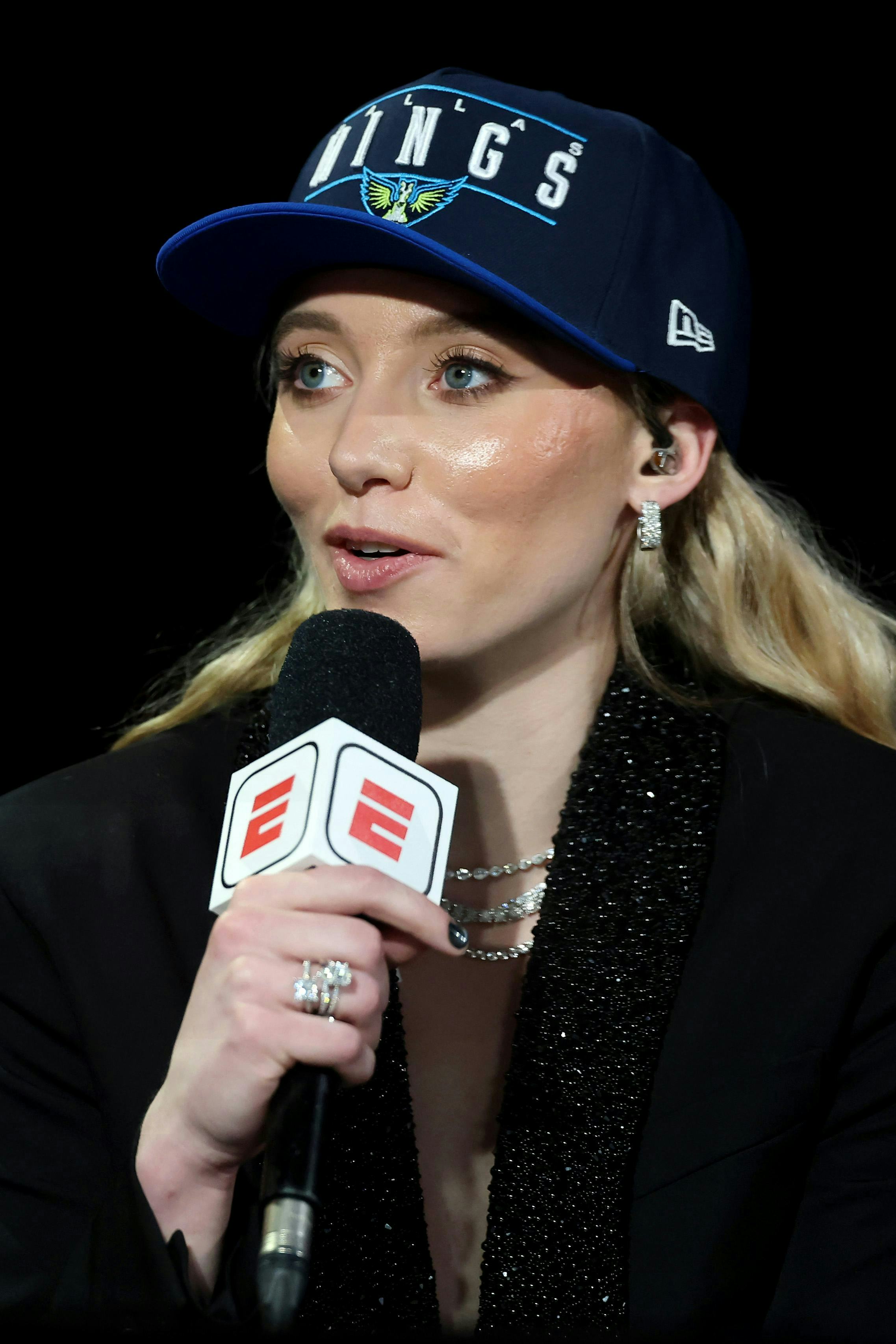 Paige Bueckers in a Louis Vuitton suit.