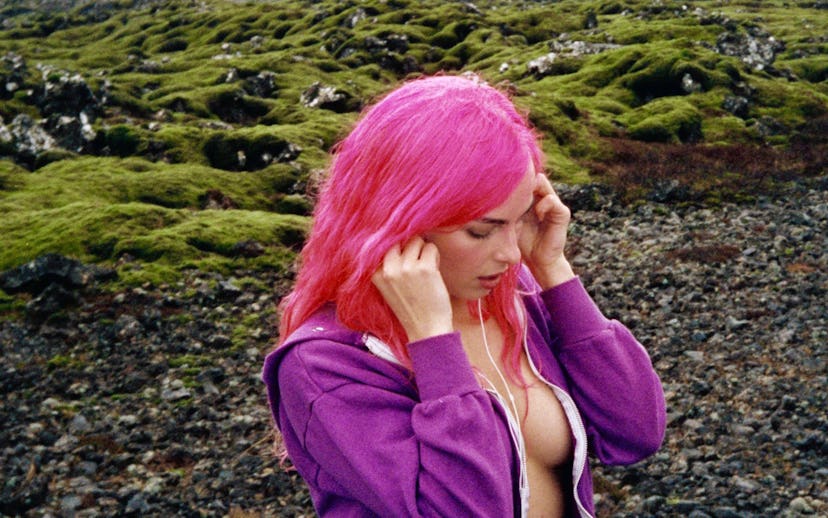 Addison Rae opens up about her insecurities in her "Headphones On" lyrics.