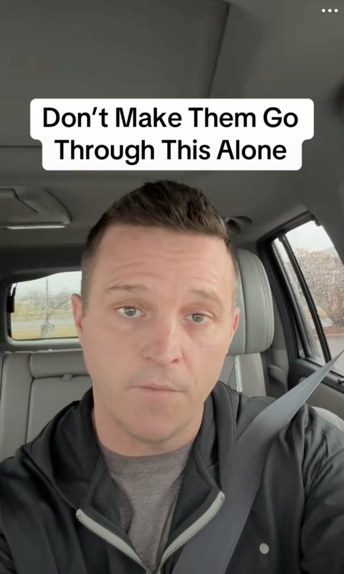 A person is sitting in a car, looking directly into the camera with a serious expression. Text above reads, "Don't Make Them Go Through This Alone."
