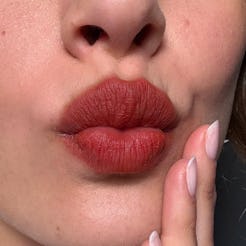 “Bitten lips” is the makeup trend you won’t have to touch up.