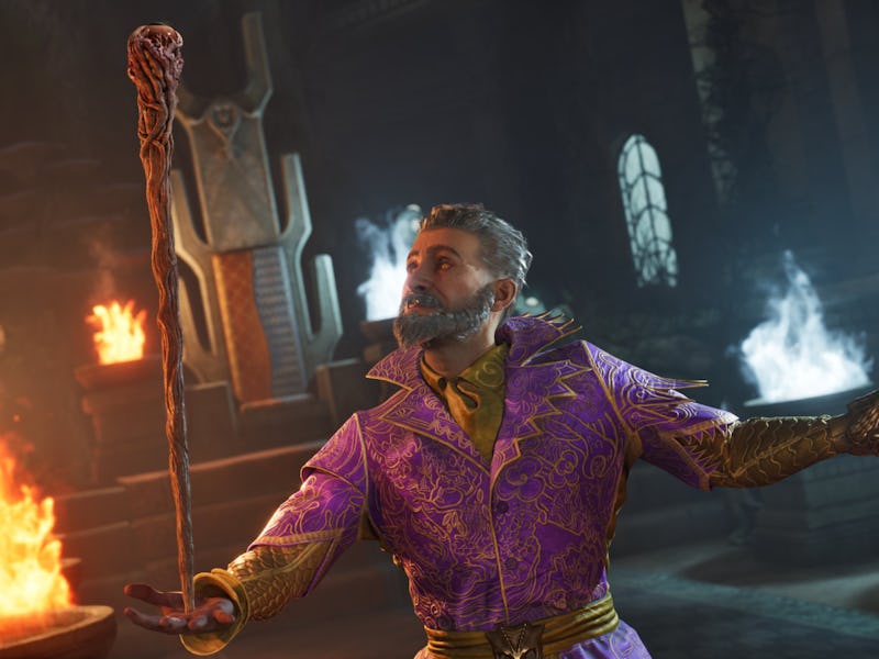 A magic user prepares a spell using a staff