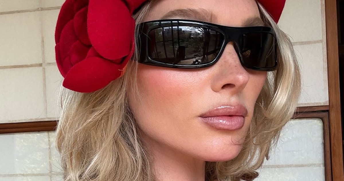 Elsa Hosk's Vacay Wardrobe Included Plunging Dresses, Balletcore, & More Trends