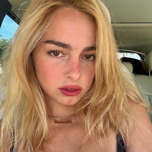 Addison Rae’s album announcement nails reference Lindsay Lohan’s 2010-era court manicure.