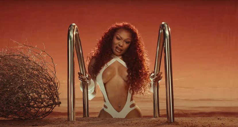 Meg Thee Stallion’s new music features cutout bodysuits, booty shorts, and more.