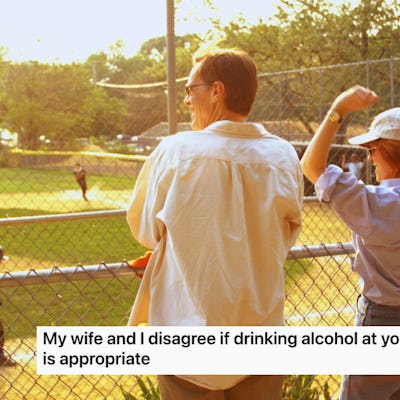 A couple watches a kids' baseball game from a fence, discussing the appropriateness of drinking alcohol at children's sporting events.