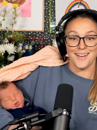 Kylie Kelce, wearing headphones and sitting in front of a microphone in front of a vibrant backgroun...