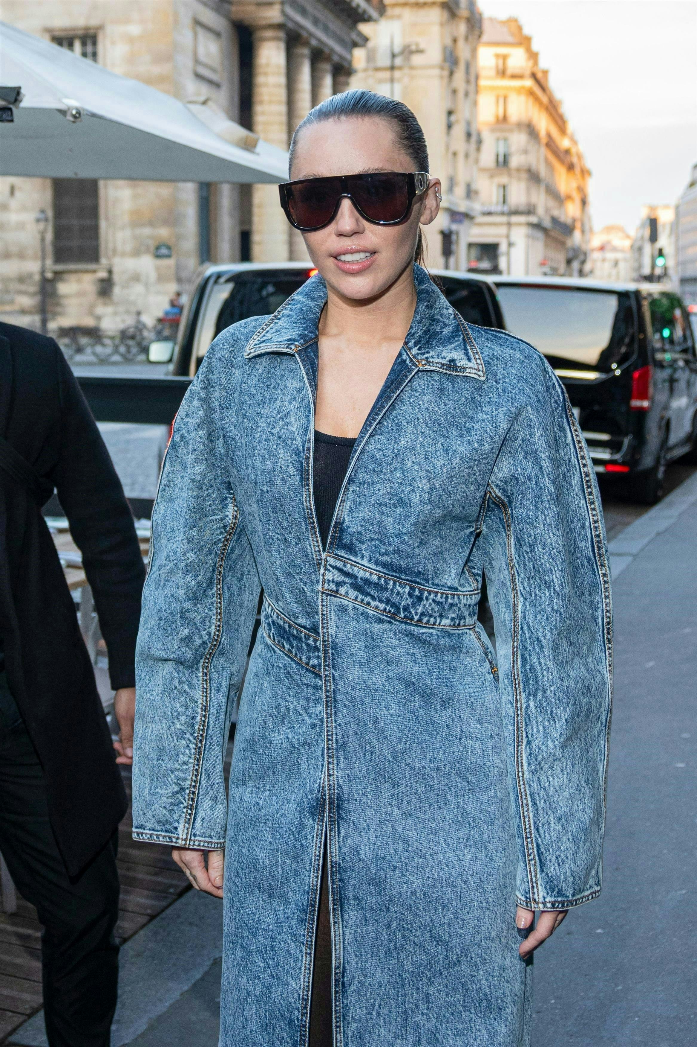 Miley Cyrus’s Pantsless Denim Coat Is Alaïa, Of Course