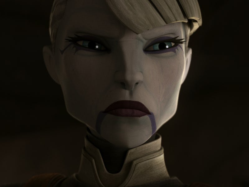 A close-up of a female character with sharp features, short blonde hair, and striking makeup, convey...