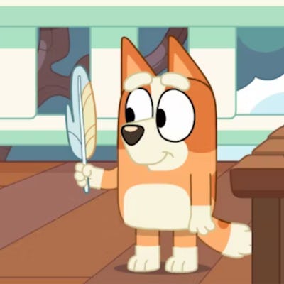 Bingo from 'Bluey' holding her feather wand, in a story answering the question, is bingo a boy or a girl?