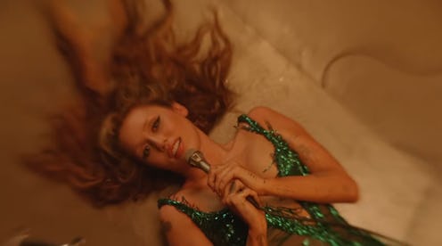 Miley Cyrus in her music video for "End of the World." Screenshot via YouTube