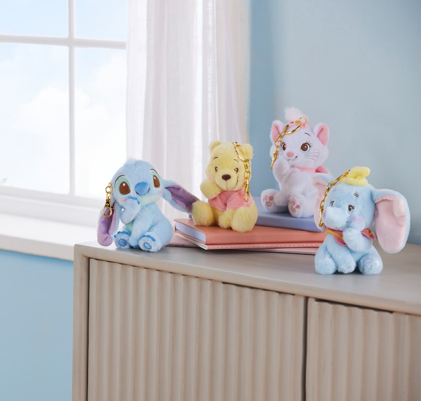 Disney Store is getting pastel plush keychains of characters like Winnie the Pooh and Stitch from Di...
