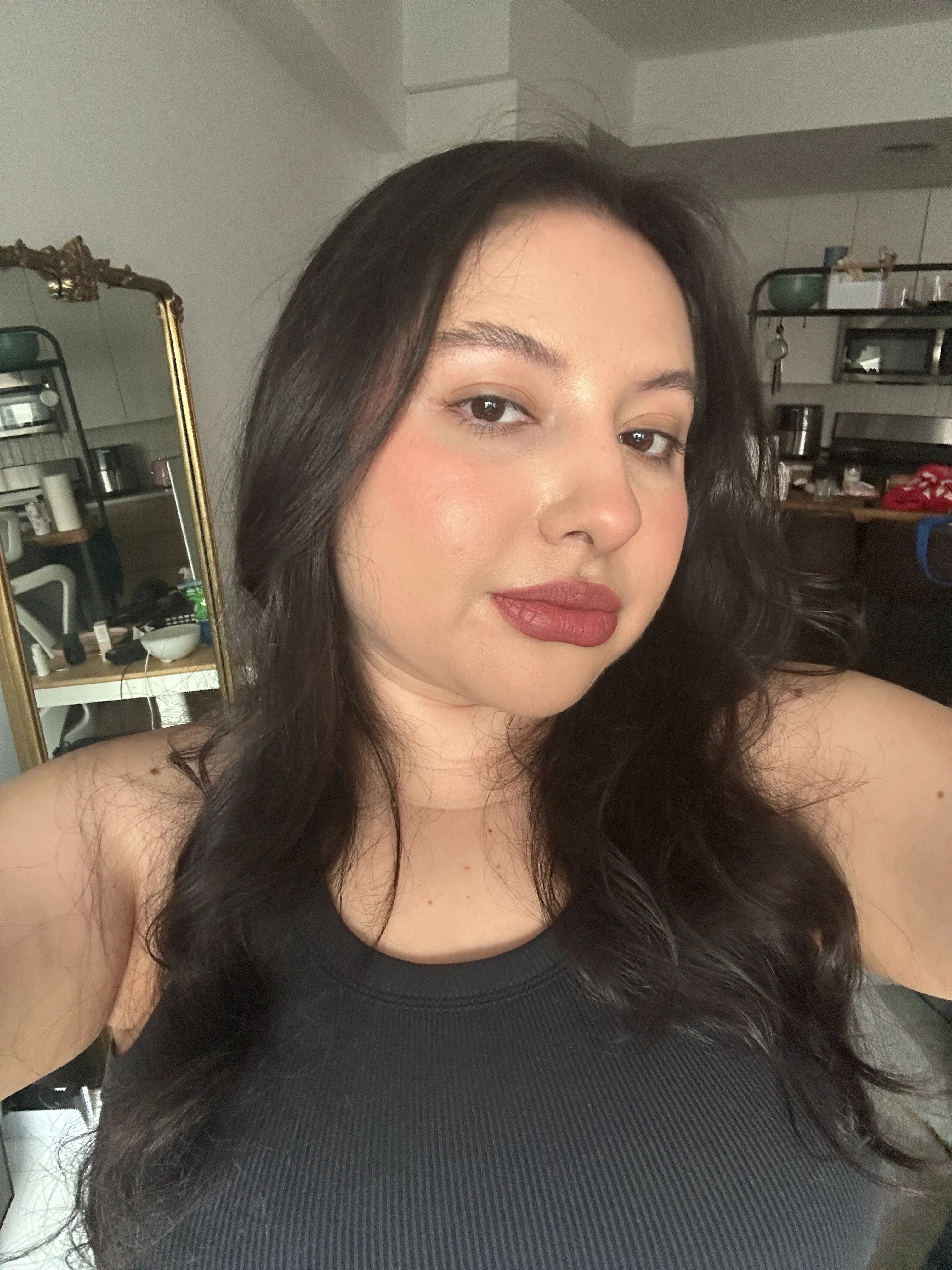 Daisy Maldonado trying the emi jay heavenly hair milk
