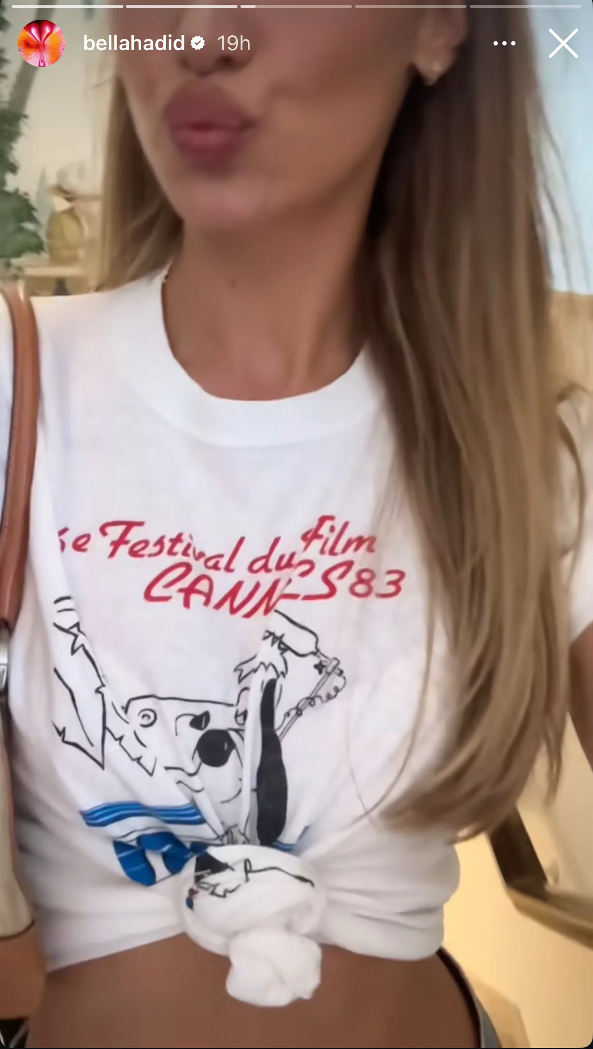 Bella Hadid wears a Cannes Film Festival cropped T-shirt. 