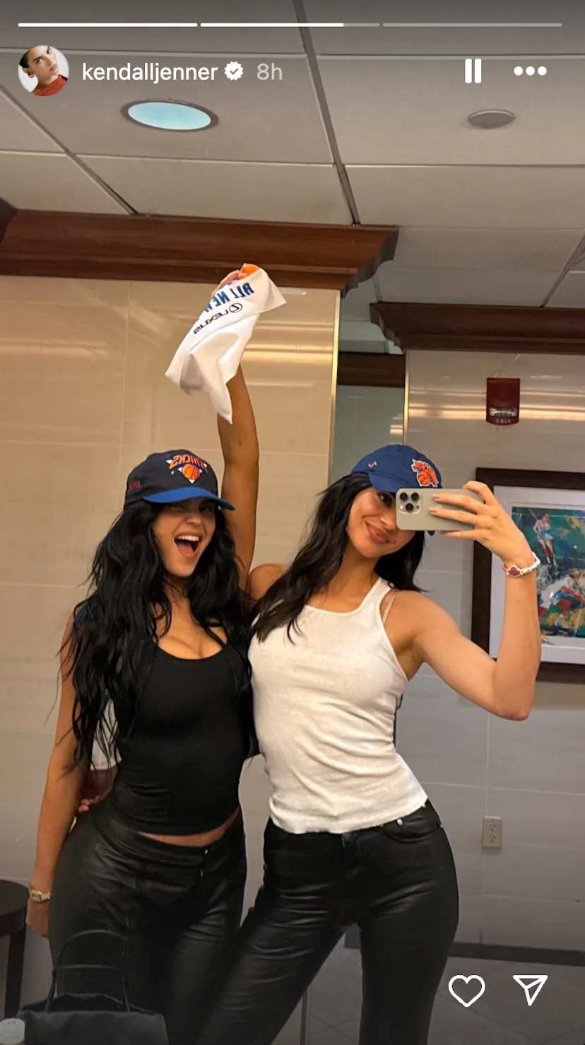 Kylie and Kendall Jenner wearing matching outfits.