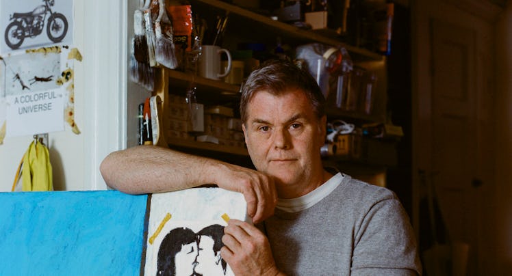Mark Milroy standing with one of his works in his Brooklyn Studio