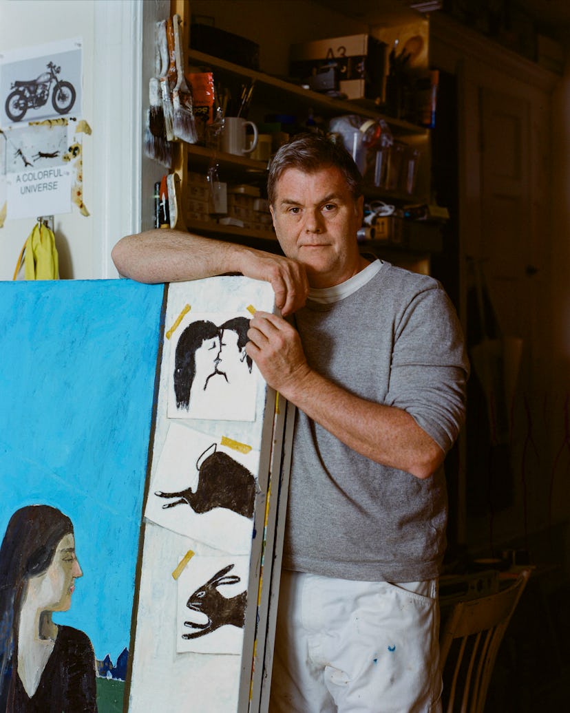 Mark Milroy standing with one of his works in his Brooklyn Studio