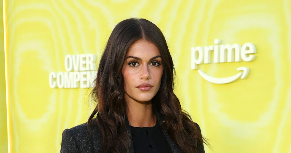 Kaia Gerber Is a NSFW Office Siren in No Pants and Sheer Stockings