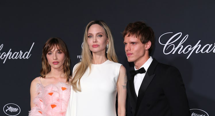 Marie Colomb, Angelina Jolie and Finn Bennett attend the photocall for the Chopard Trophy at the 78t...