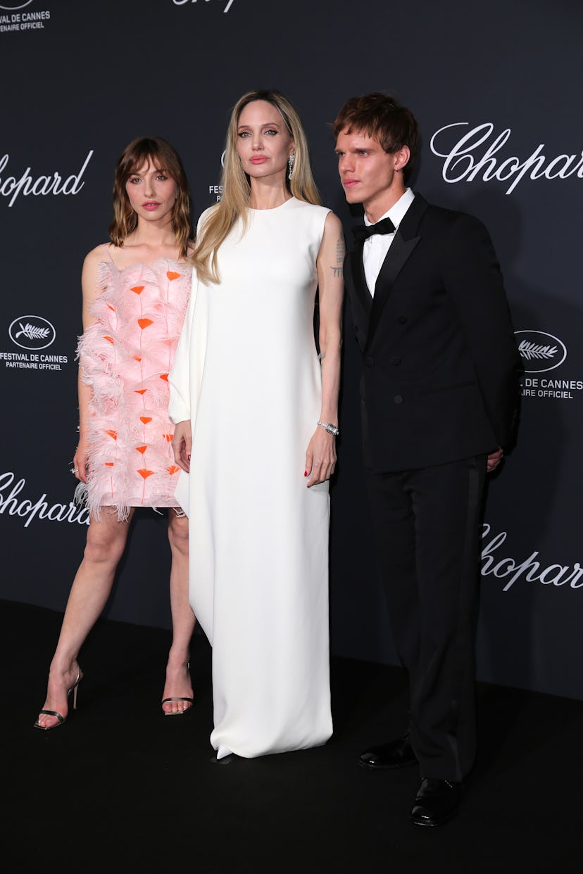 Marie Colomb, Angelina Jolie and Finn Bennett attend the photocall for the Chopard Trophy at the 78t...