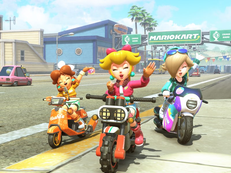 From left to right, Daisy, Peach, and Rosalina, on motorcycles.