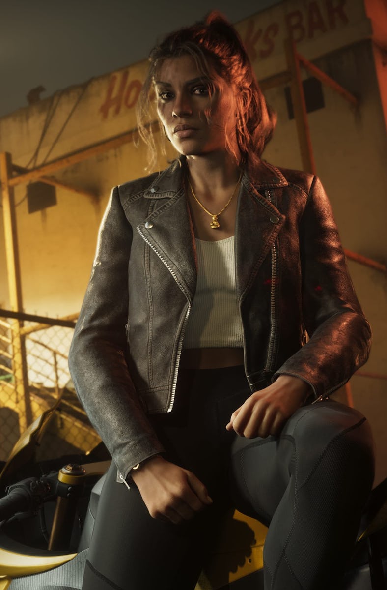 Lucia leans against a bike