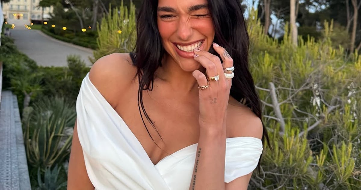 Dua Lipa Paired A Cone Bra With Baby Bangs On The Cover Of British 'Vogue'