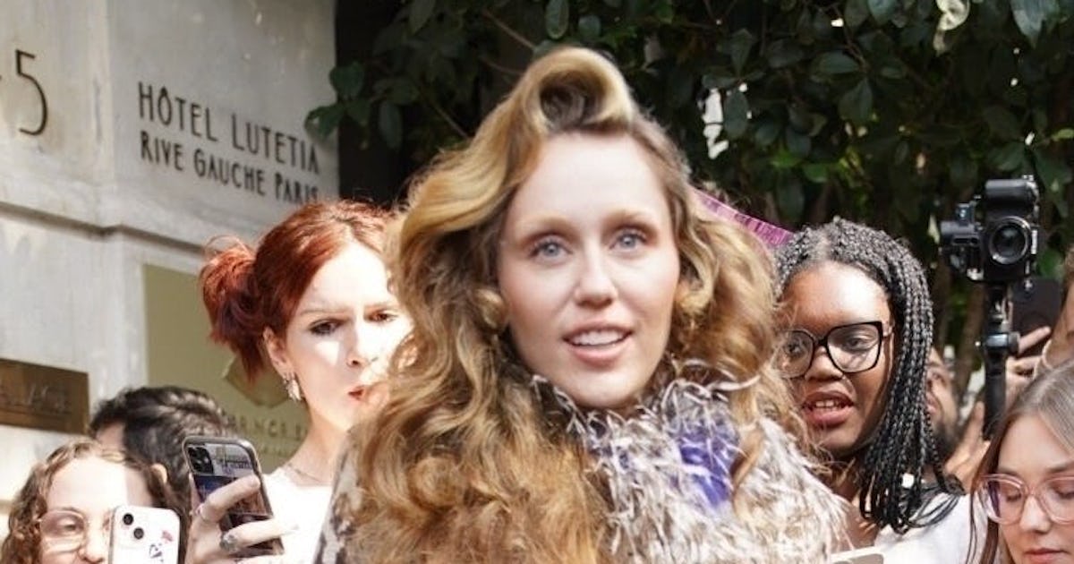 Miley Cyrus Goes Wild in Micro-Mini Animal Print Dress & Tights-Under-Heels