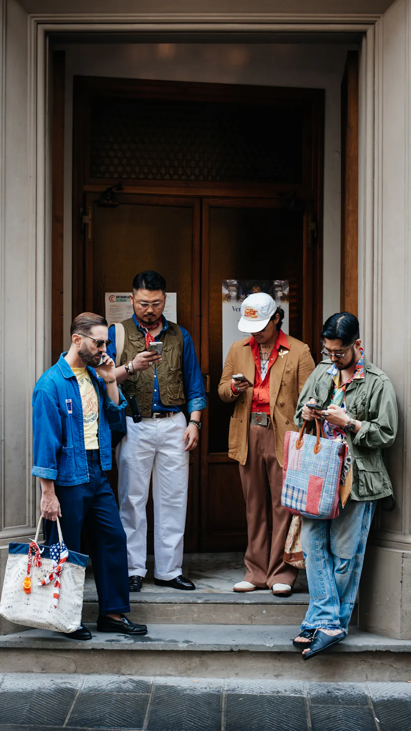 Street style during Pitti Uomo Spring 2026 on June 17, 2025 in Florence, Italy