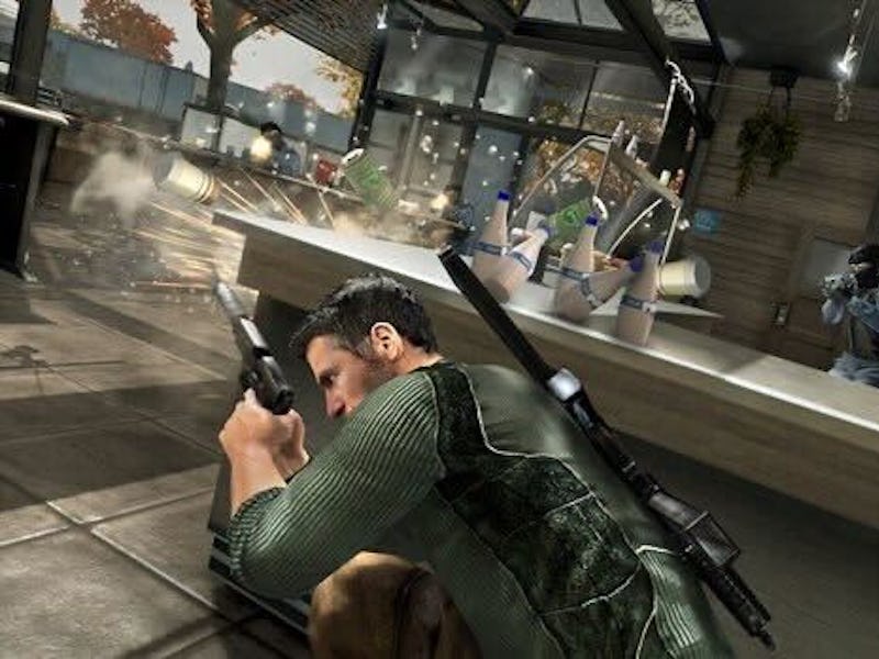 Sam Fisher in Splinter Cell Conviction taking cover from gunfire.