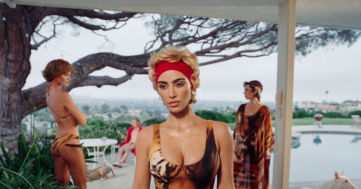 Kim Kardashian Goes Blonde Bombshell (Again) For Skims x Roberto Cavalli Swim Collab