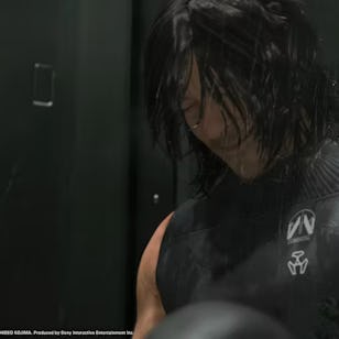 A muscular figure with wet hair and a sleek black vest stands in a dimly lit space, possibly a locker room, exuding an intense focus.