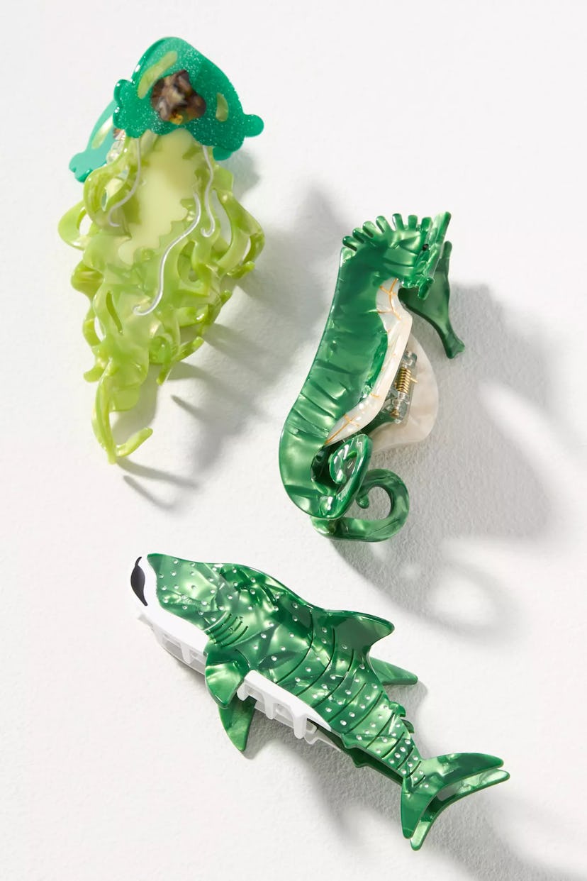 set of three green fish claw clips in a story about summer hair accessories