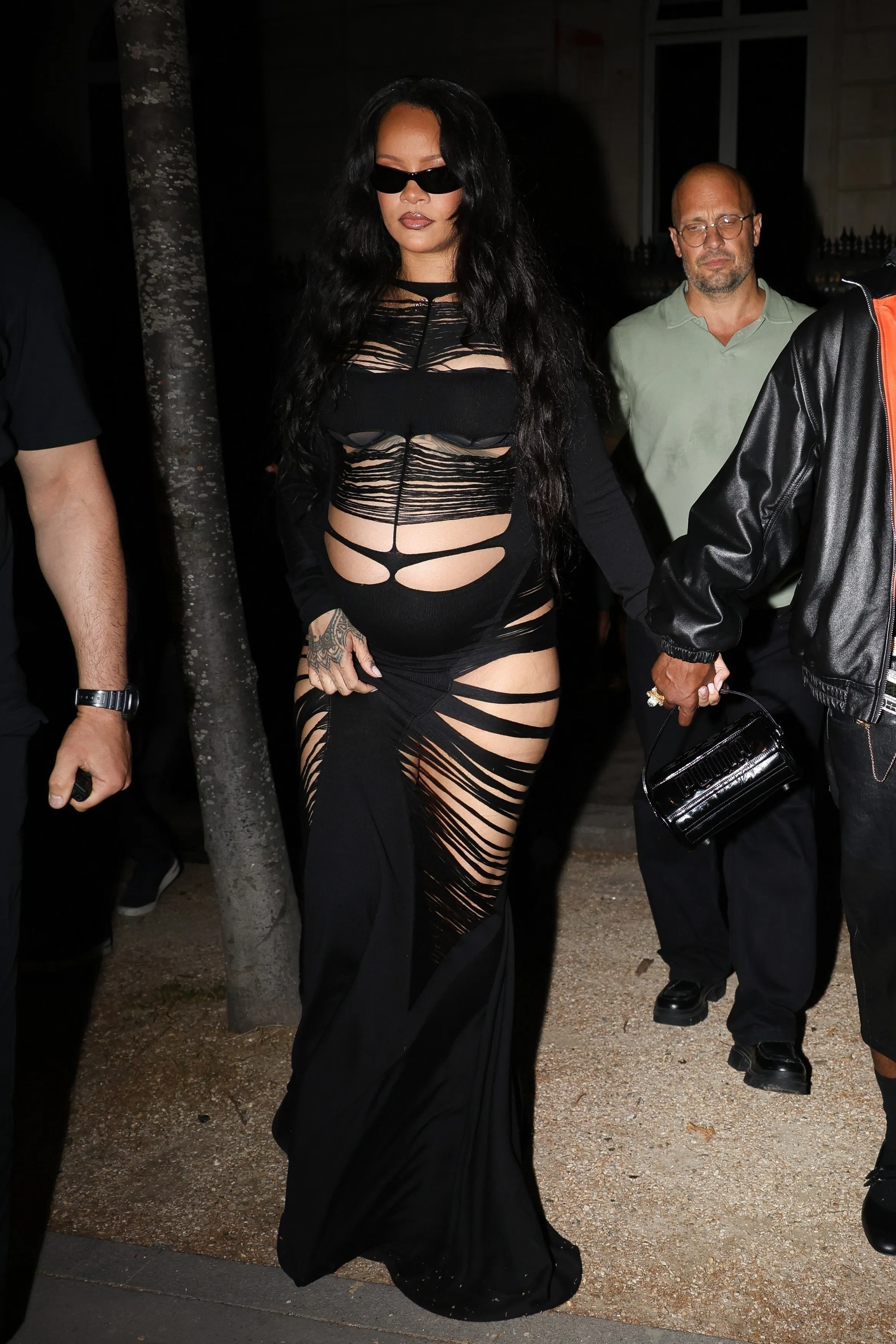 rihanna black cut out chain maxi dress Rihanna Elevates Maternity Fashion in a Black Cut-Out Dress