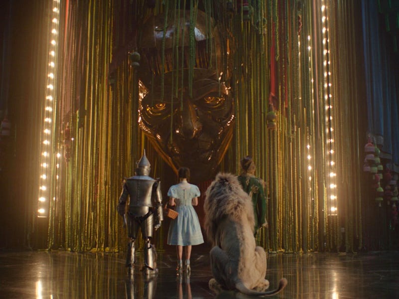 The Tin Man, Dorothy Gale, the Cowardly Lion, and the Scarecrow meet the Wizard of Oz (Jeff Goldblum...