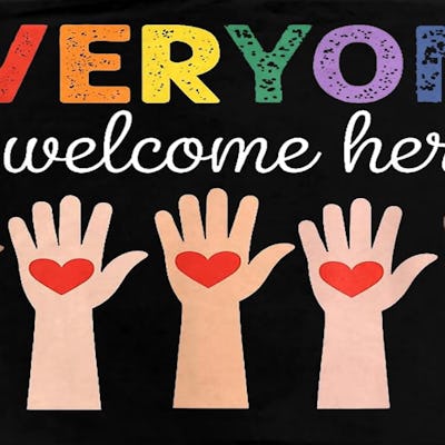 A banner featuring the phrase "EVERYONE is welcome here," with colorful lettering and five diverse hands raised, each sporting a red heart on the palm.