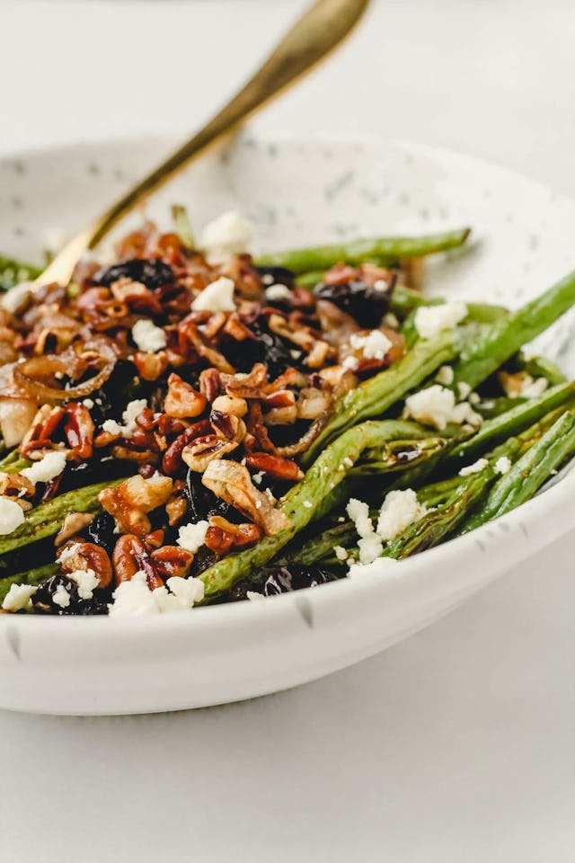Roasted Green Beans with Crispy Shallots and Feta, in a story about green bean recipes
