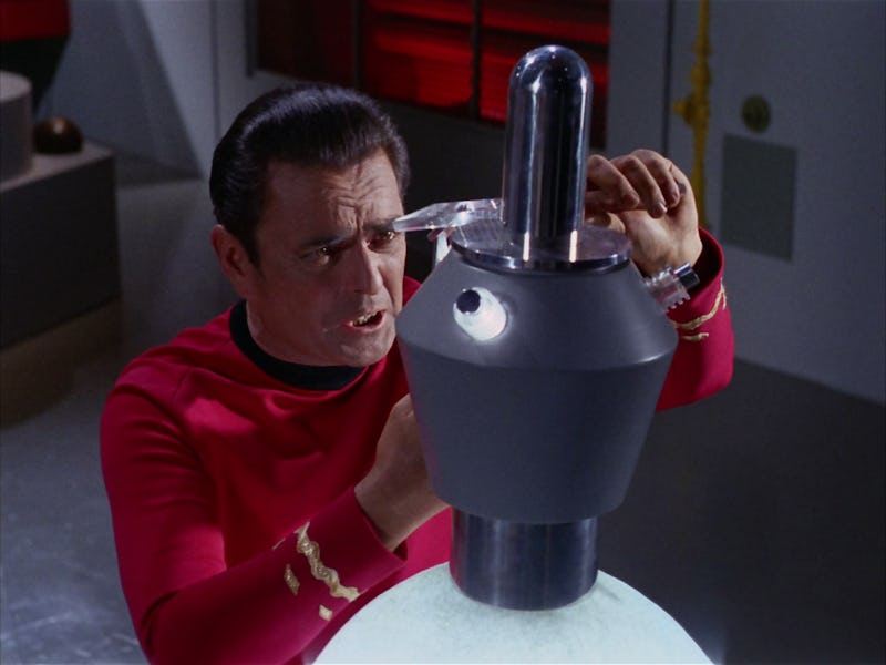 Scotty working on a Romulan cloaking device in 'The Enterprise Incident."