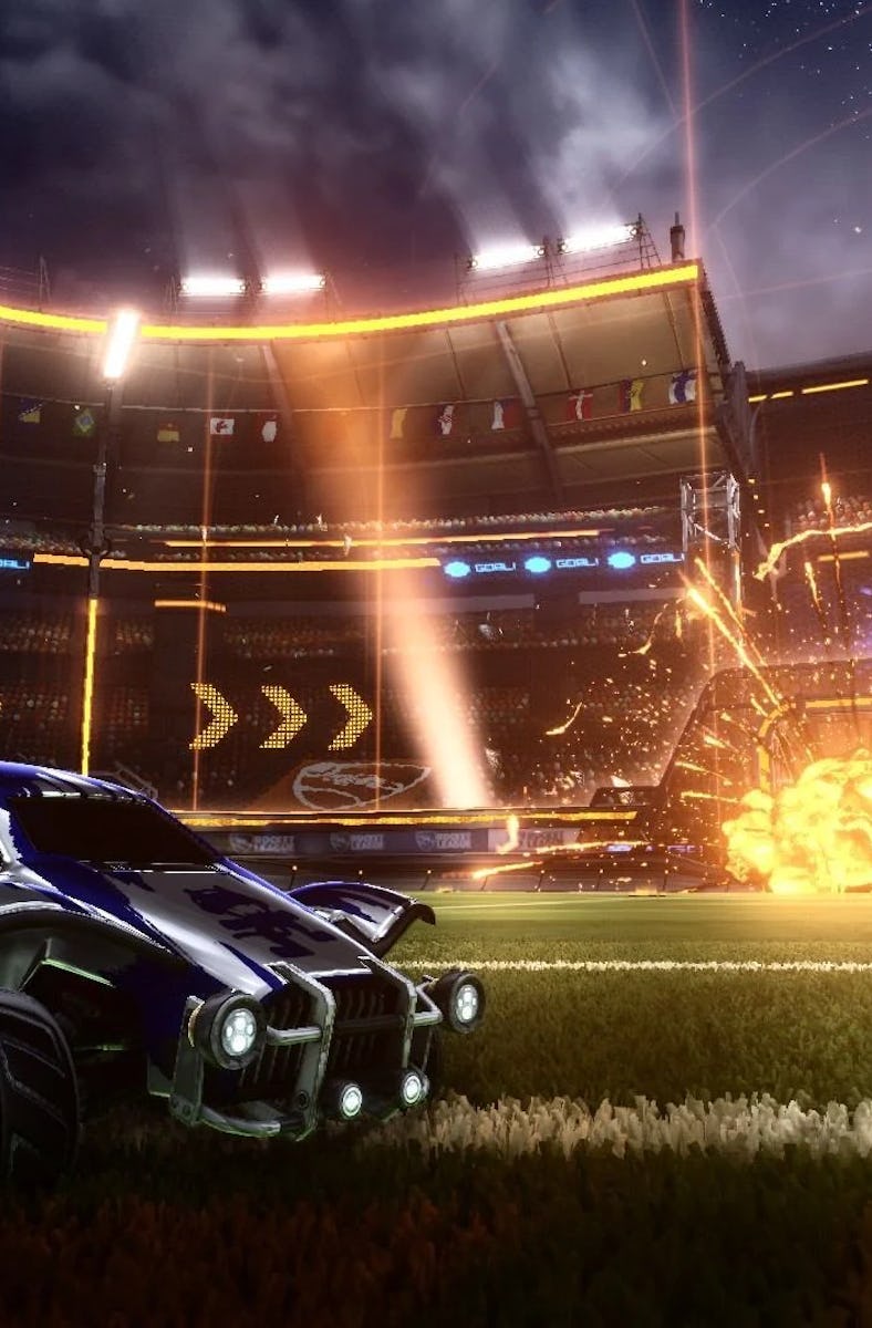 A car parked in front of an explosion in front of a net.