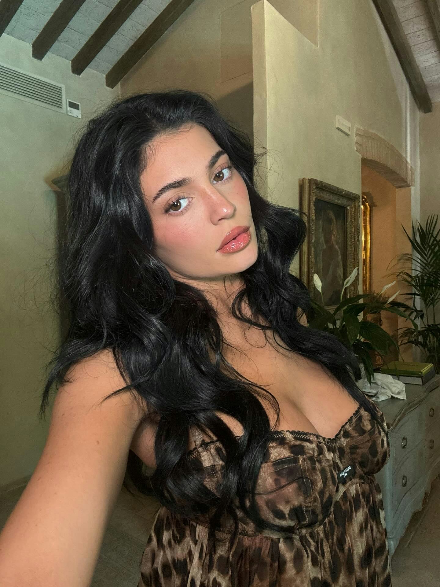 Kylie Jenner wears a polka dot bikini. 