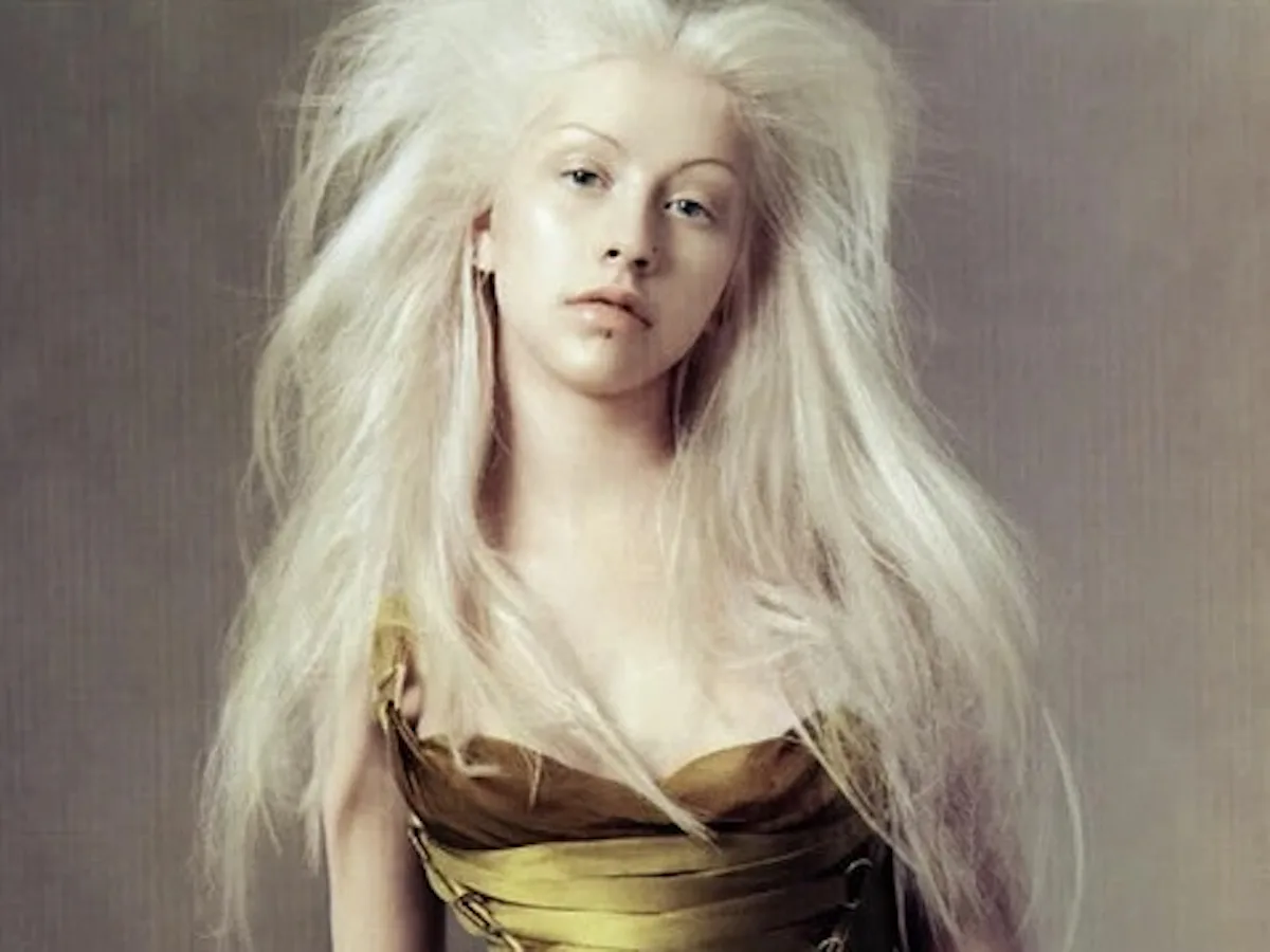 christina aguilera green versace dress Christina Aguilera revives iconic Versace corset dress 22 years later